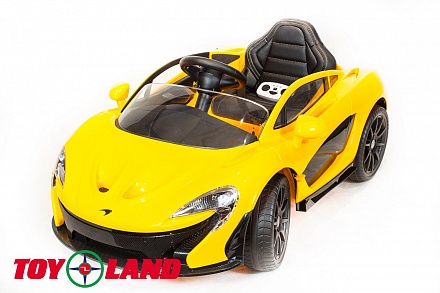 Электромобиль McLaren желтого цвета 